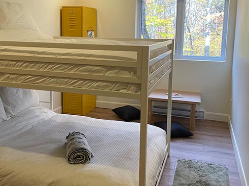 Bunk beds with view on the forest